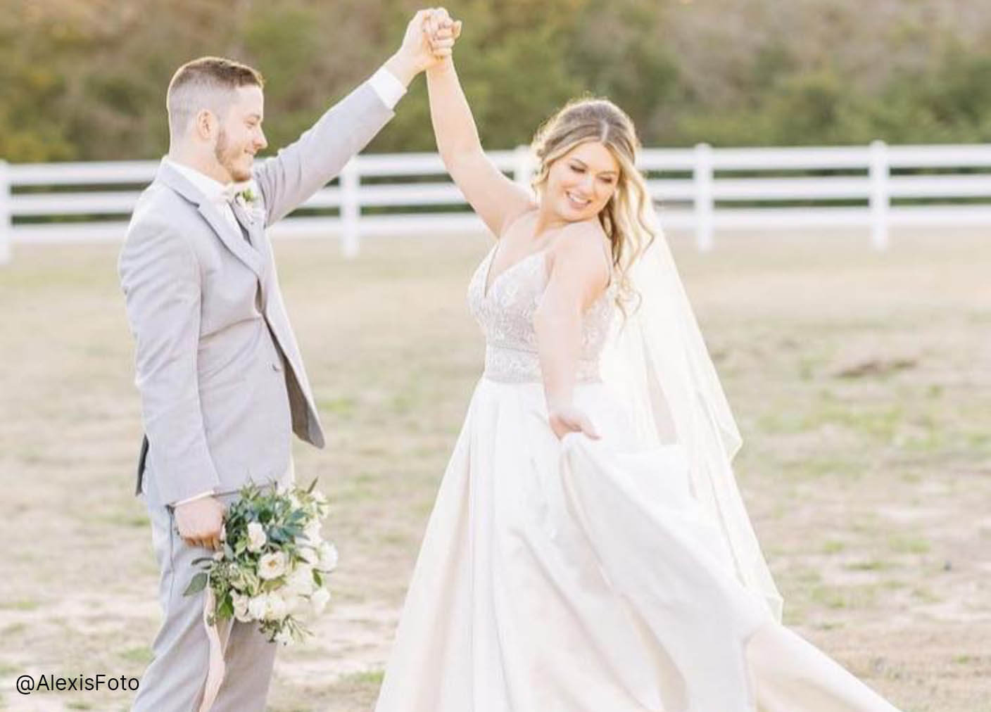 Сouple wearing a white gown and a gray suit